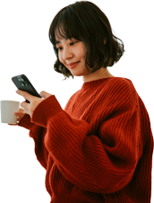 Woman with phone typing address